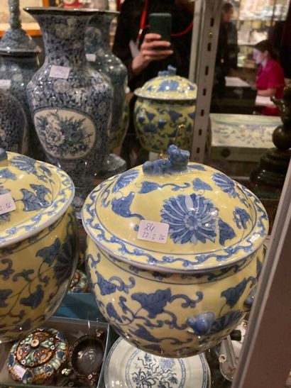 Lot including:
Set of four vases and one...