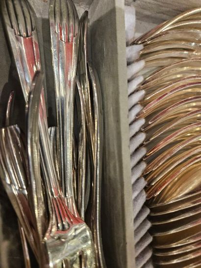 Part of a silver-plated menagère with channels,...