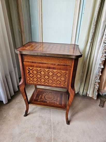 Living room table opening to three drawers...