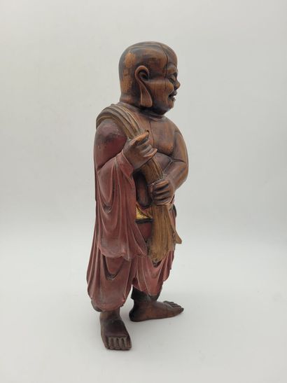CHINA
Wooden sculpture of Lohan, wearing...