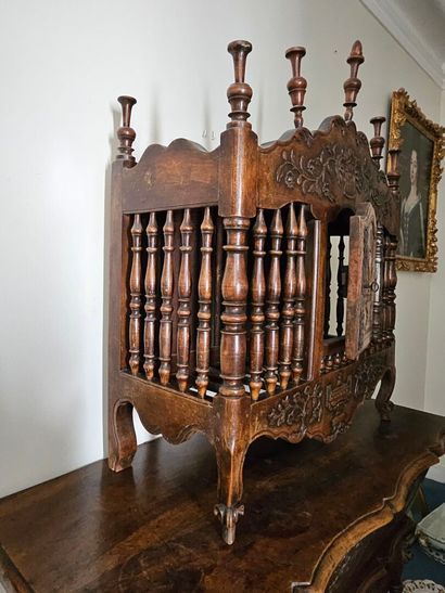 Turned, molded and carved walnut pan with...