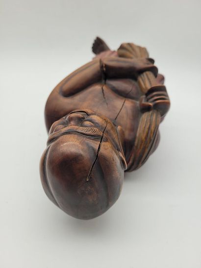 CHINA
Wooden sculpture of Lohan, wearing...