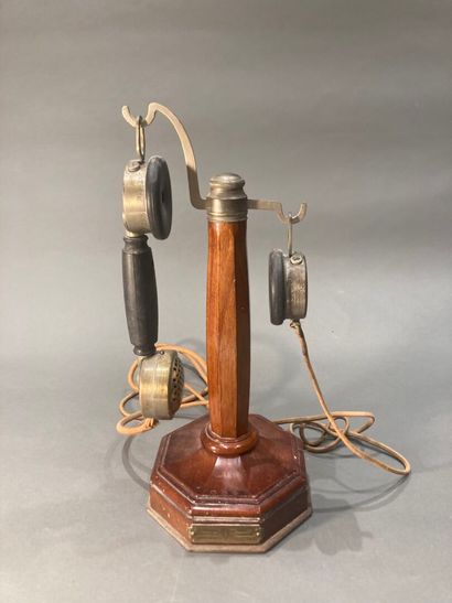 Walnut telephone with octagonal base and...