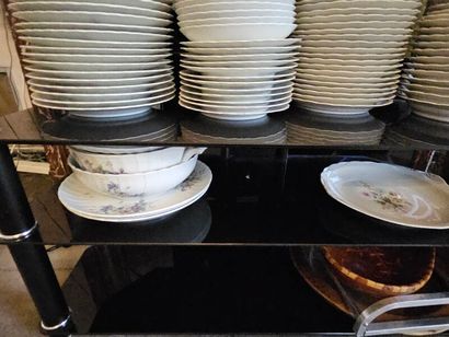 Two sets of white porcelain dinner services...