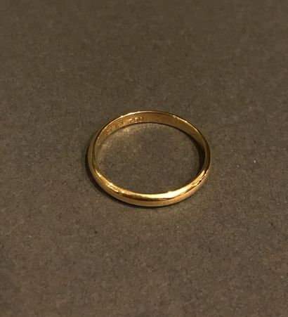 Lot including:
-Wedding band in 18K yellow...