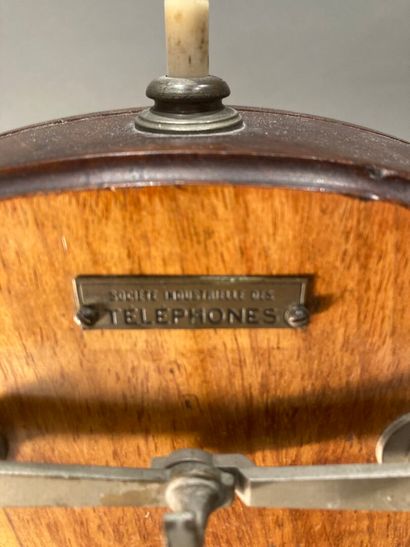 Violin-type mobile telephone in mahogany...