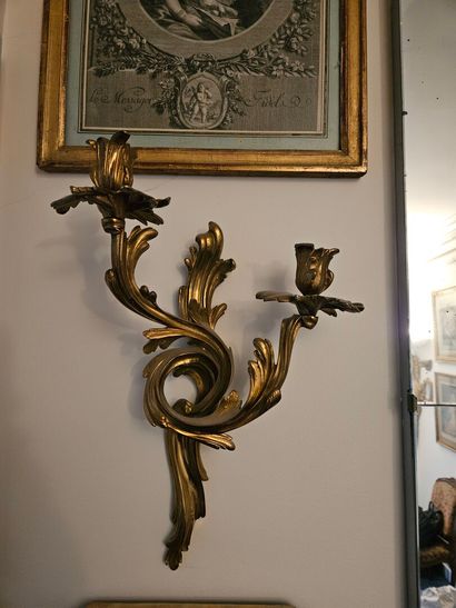 Pair of two-light ormolu sconces in rocaille...