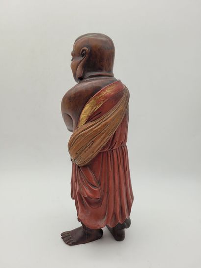 CHINA
Wooden sculpture of Lohan, wearing...