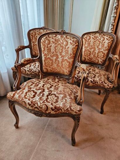 Three cabriolet armchairs in natural wood...