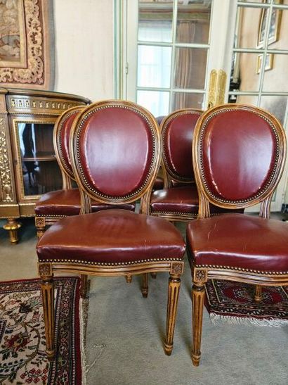 Suite of six carved natural wood chairs with...