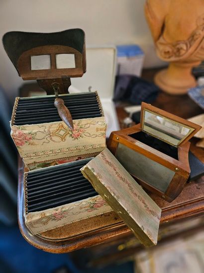 Two stereoscopic viewers and a set of glass...