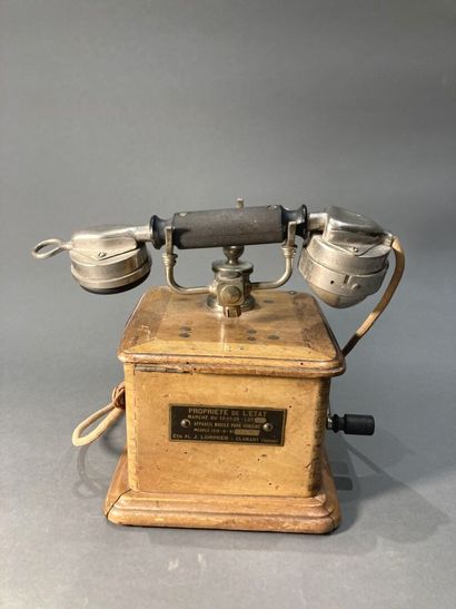 Marty oak and metal telephone stamped 