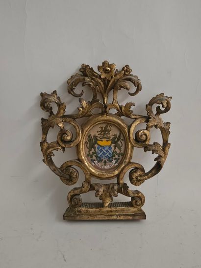 Rocaille-style wood and gilded stucco frame...