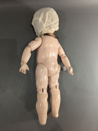 Baby Caractère
Porcelain head debossed with...