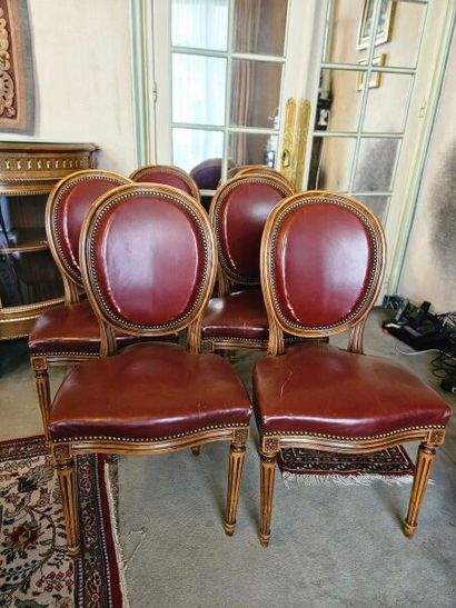 Suite of six carved natural wood chairs with...