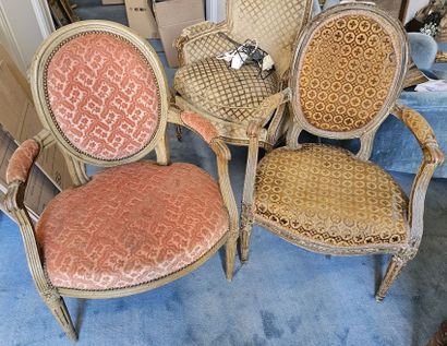 Two cabriolet armchairs in molded and carved...