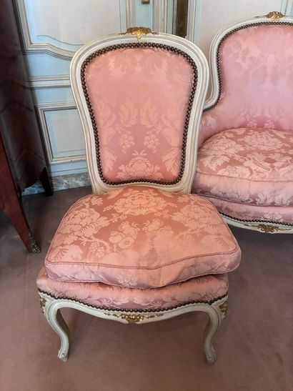 Bergère and chair in cream and gold lacquered...