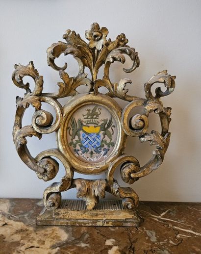 Rocaille-style wood and gilded stucco frame...