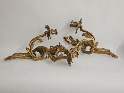 Pair of two-light ormolu sconces in rocaille...