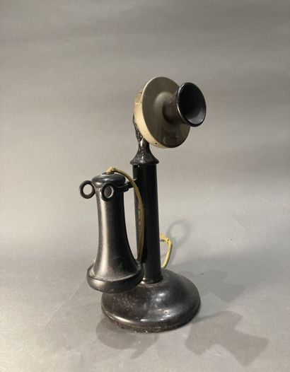 Black metal candle cell phone with pear-shaped...