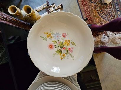 Two sets of white porcelain dinner services...