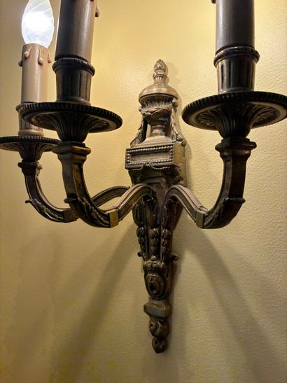 Pair of three-light ormolu sconces topped...