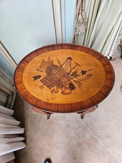 Oval-shaped coffee table in wood veneer and...