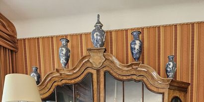 Lot including:
Set of four vases and one...
