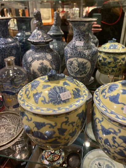 Lot including:
Set of four vases and one...