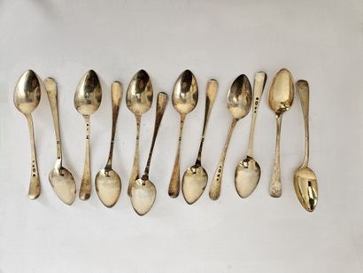 Lot including:
-Seven silver dessert spoons...
