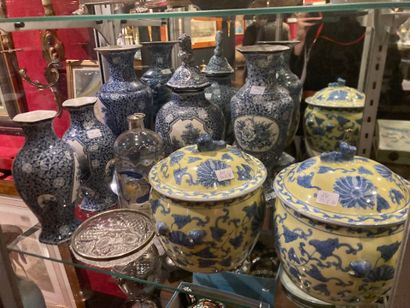 Lot including:
Set of four vases and one...