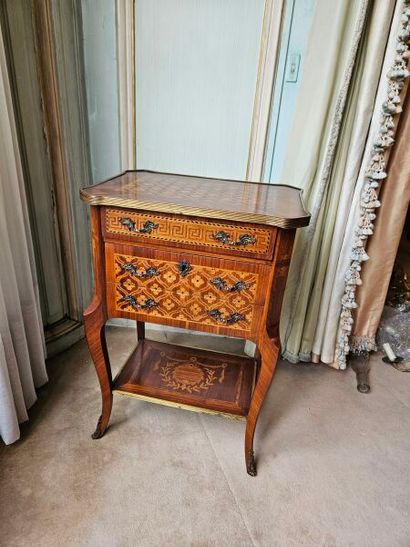 Living room table opening to three drawers...