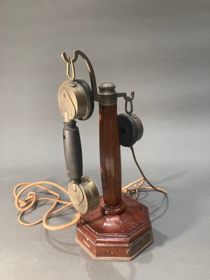 Walnut telephone with octagonal base and...