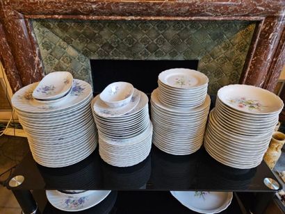 Two sets of white porcelain dinner services...