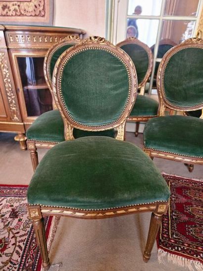 Suite of five carved giltwood chairs with...