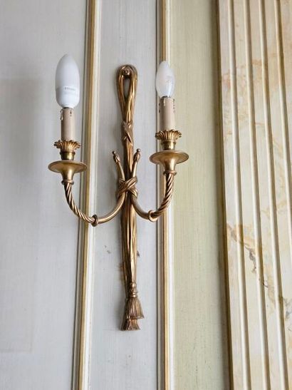 Four two-light ormolu sconces with knotted...