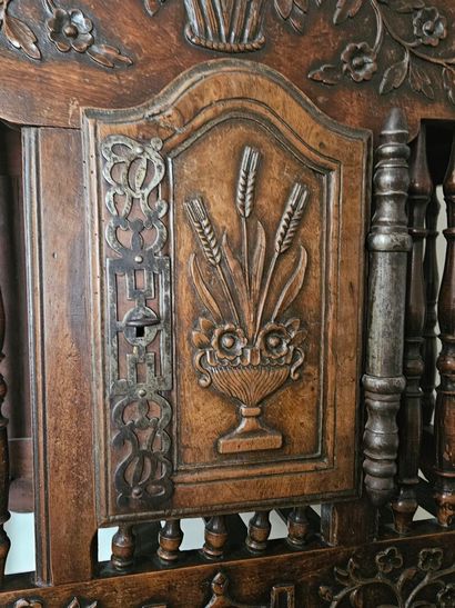 Turned, molded and carved walnut pan with...