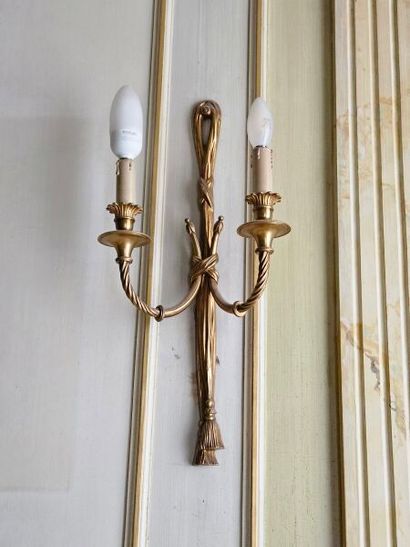 Four two-light ormolu sconces with knotted...