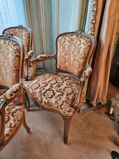 Three cabriolet armchairs in natural wood...