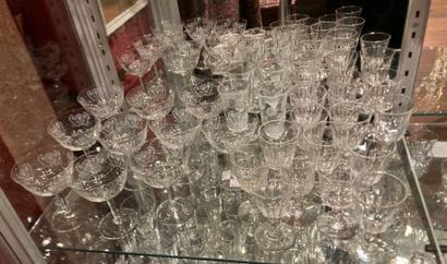 Set of various mismatched glasses including...