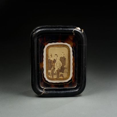 Photograph of four children 
8 x 5 cm (broken...