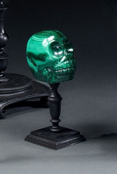 Malachite monkey skull with bulging eyes
H....