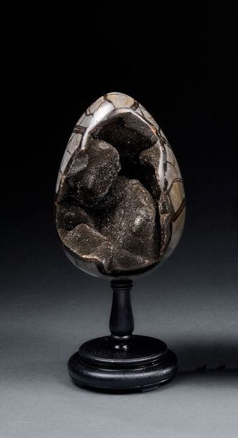 Giant Septaria egg on wooden base
Black calcite...