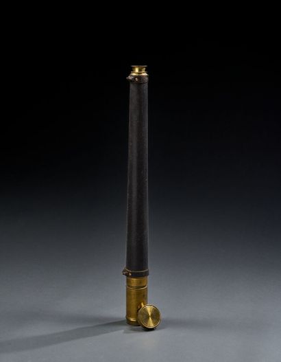 Large black leather-wrapped spyglass with...