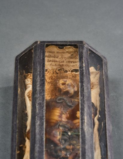 Wooden and brass coffin closed by four hooks...