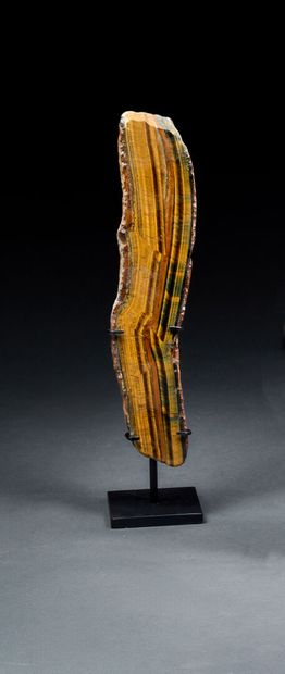 Tiger's eye slice on base
H. 32 cm