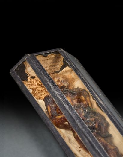 Wooden and brass coffin closed by four hooks...