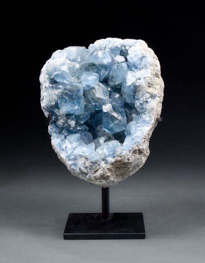 Sky-blue celestine geode on base
H. 29 c...