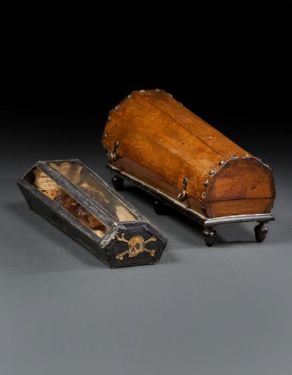 Wooden and brass coffin closed by four hooks...