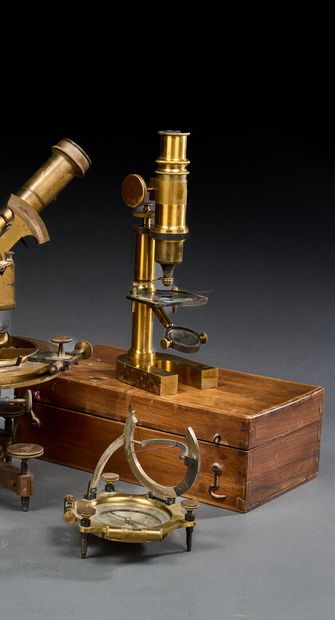 Small varnished brass microscope in oak case
29...